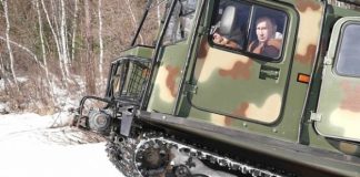 Путин покатал Шойгу по тайге на вездеходе